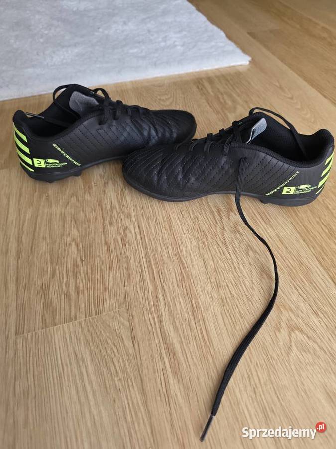 Buty piłkarskie korki Kipsta 100 czarnoneonowe łódzkie Bełchatów