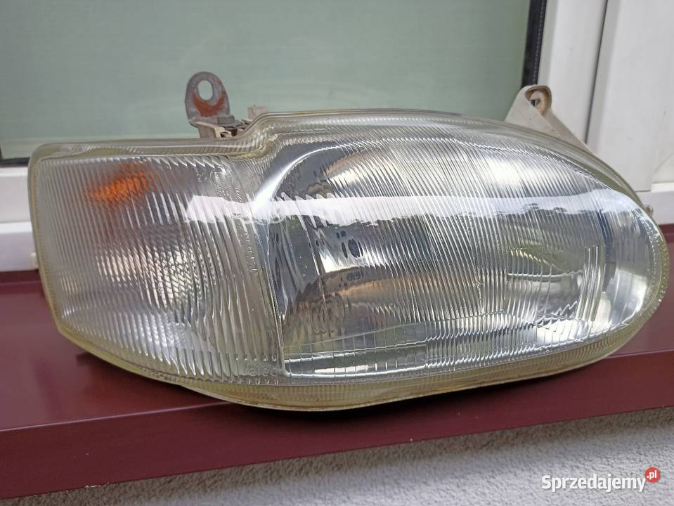 Ford Escort MK7 VII lampa przednia prawa Lampy przednie Sieradz