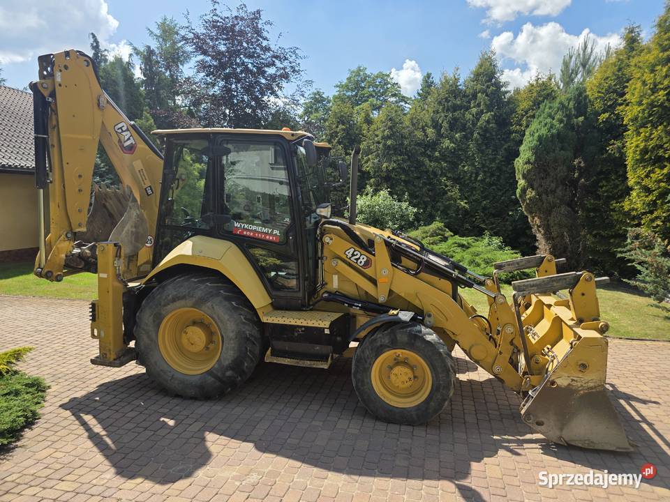 Caterpillar CAT 428 Koparkoładowarka super stan Rok produkcji 2021 Łubie