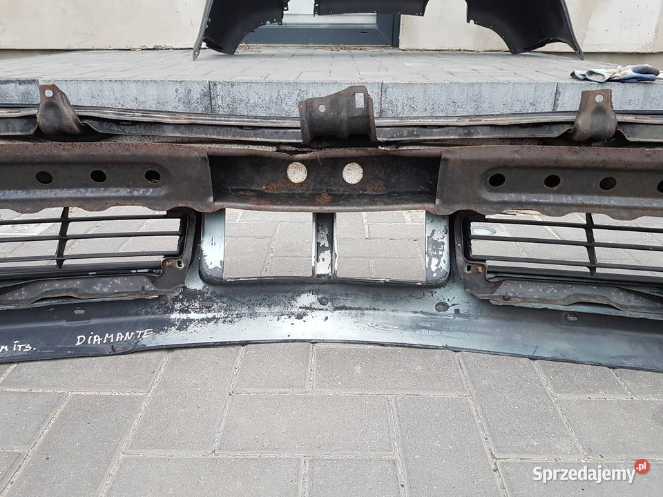 MITSUBISHI DIAMANTE ZDERZAK PRZOD SPRYSKIWACZE Turek