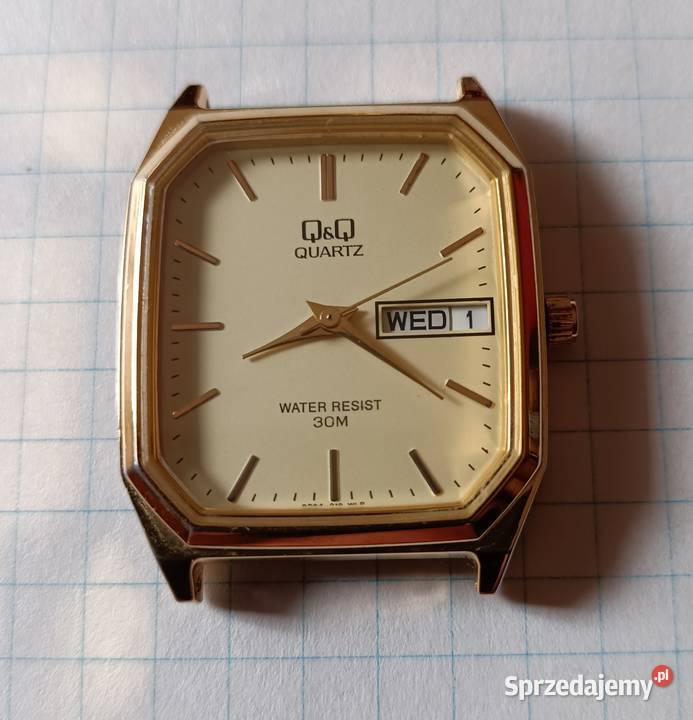 ZEGAREK MARKI QQ QUARTZ W KOLORZE ZŁOTYM Piszczac
