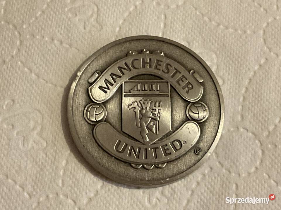 Potrójna moneta upamiętniająca osiągnięcie