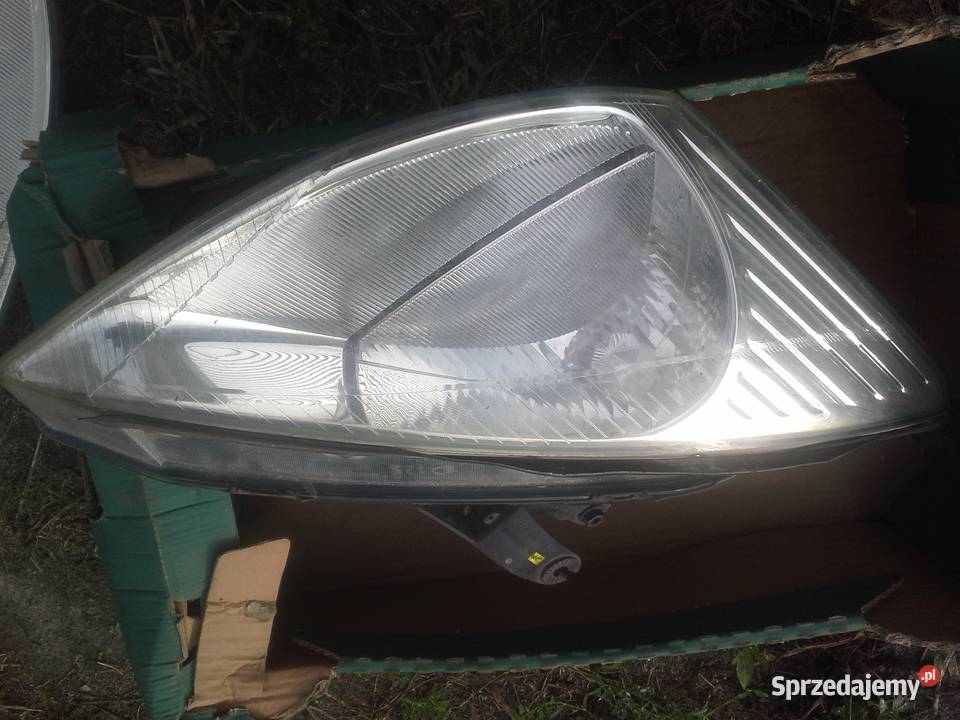 FORD FOKUS MK1 lampa przód ORYG 9801 Oświetlenie Dębno