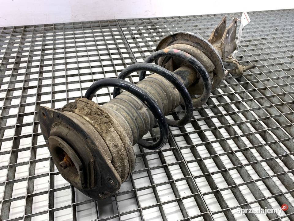 AMORTYZATOR LEWY PRZÓD ZE SPRĘŻYNĄ RENAULT