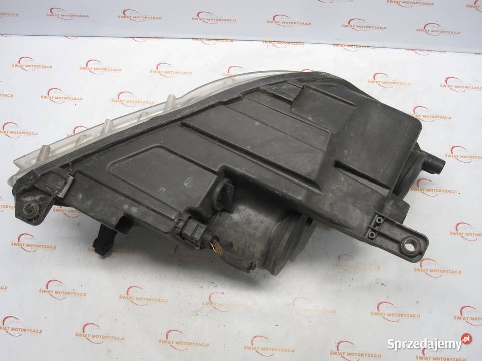 VOLKSWAGEN TIGUAN I 10r lampa lewa przód ANGLIK osobowe Lampy przednie