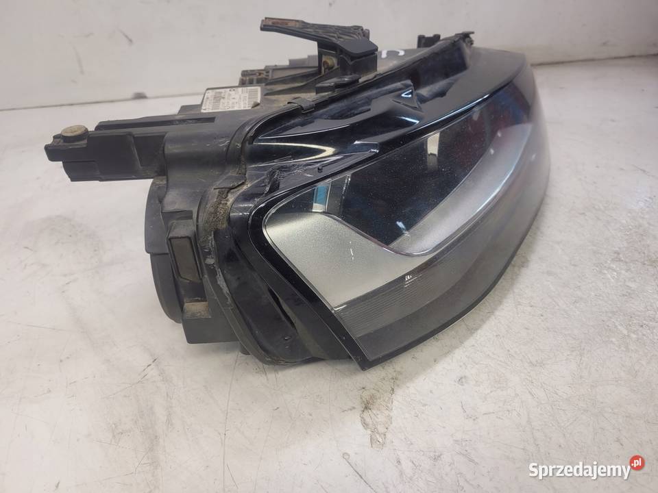 REFLEKTOR PRAWY PRZÓD AUDI A4 B8 LIFT 8K0941004M Oświetlenie Przystajń sprzedam