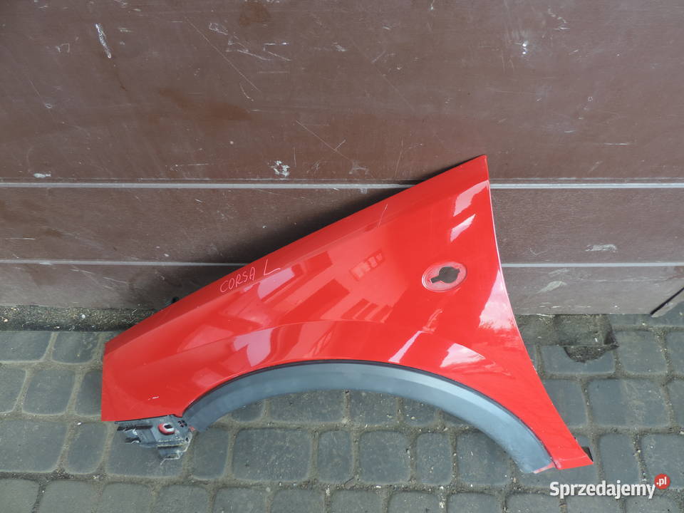 OPEL CORSA C FL BŁOTNIK LEWY PRZÓD Z573