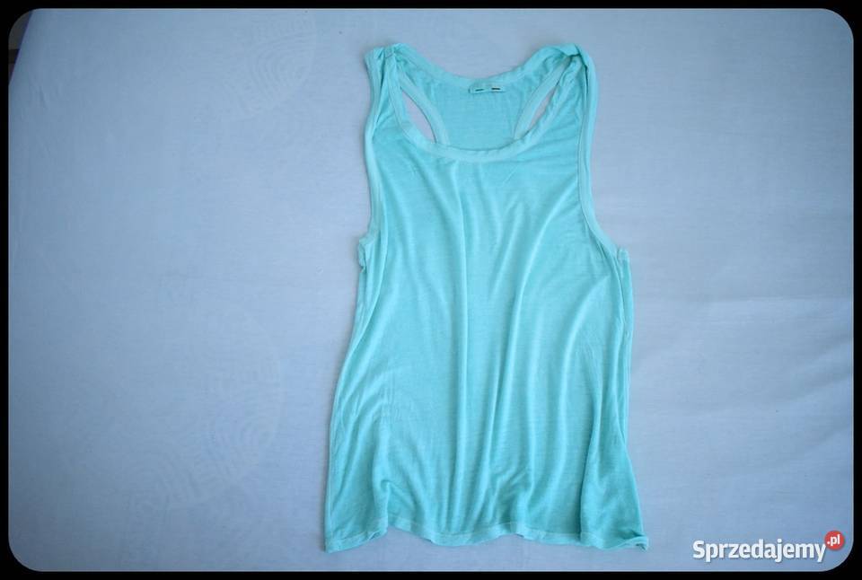 Miętowa bokserka mocno wycięta narzutka bluzka mazowieckie Płock