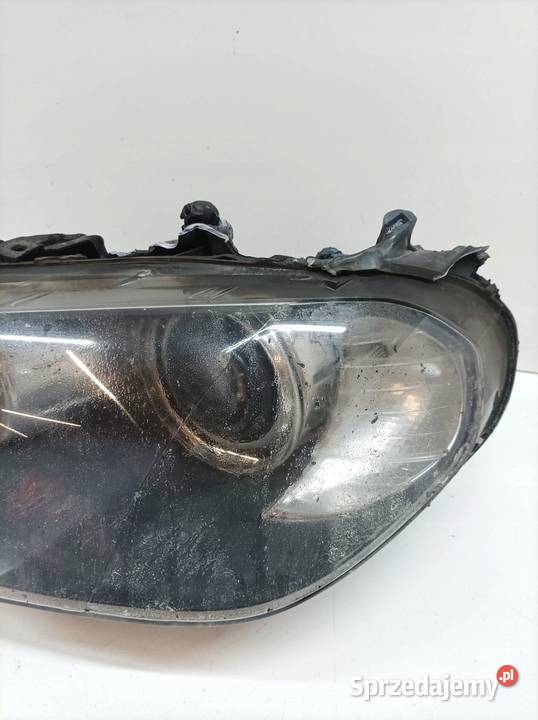 LAMPA PRZÓD LEWA XENON EU USZKODZONA Bmw X5 II Lampy przednie