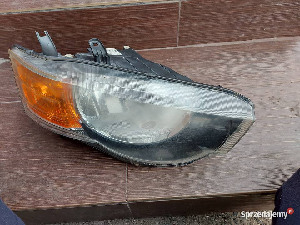 Lampa Prawa przód przednia reflektor MITSUBISHI Tychy