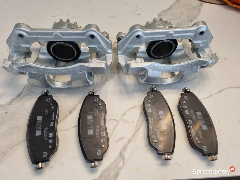 ZACISK HAMULCOWY LEWY kompletny 638494 02065R Poznań sprzedam