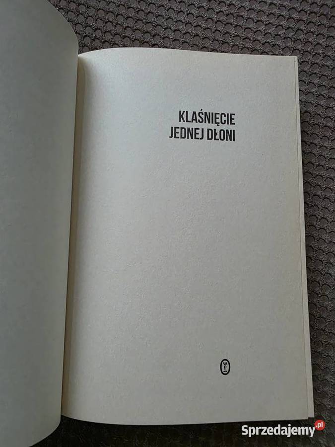 Richard Flanagan Klaśnięcie jednej dłoni twarda Kraków