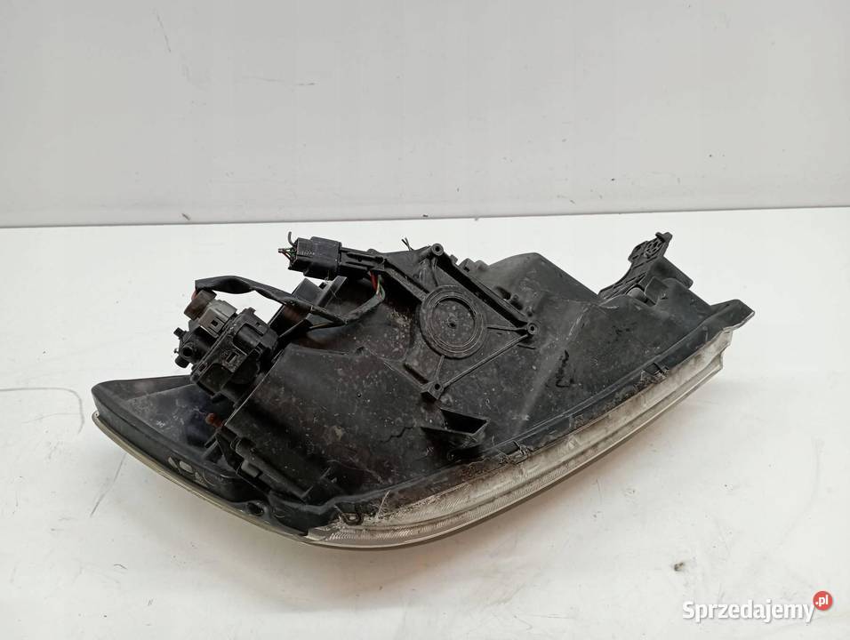 LAMPA PRZÓD LEWA EU Mitsubishi Lancer VII 2003 Lampy przednie