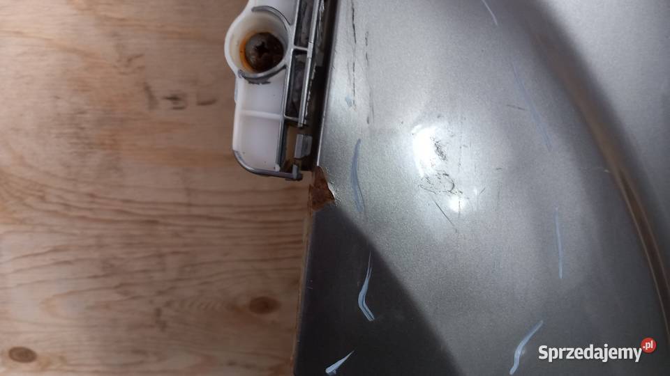 MITSUBISHI OUTLANDER II BŁOTNIK PRZÓD LEWY Zbierkowo