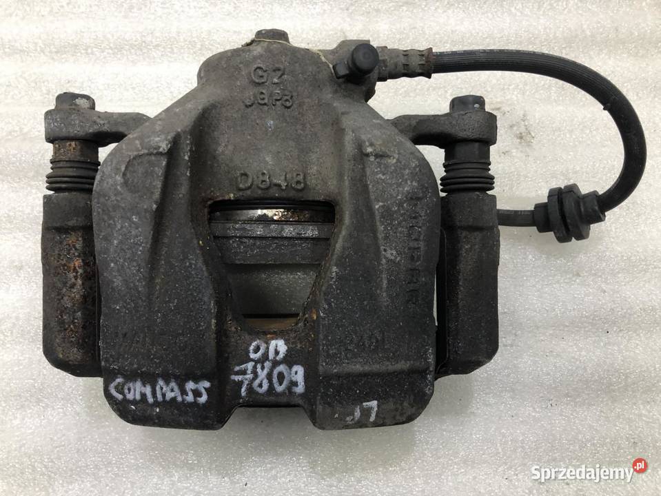 ZACISK HAMULCOWY LEWY PRZÓD JEEP COMPASS II 14 osobowe