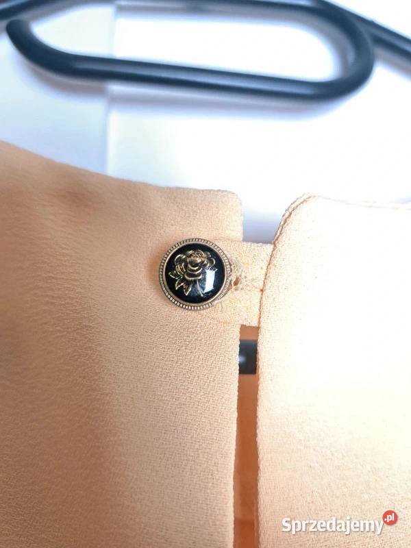 Sukienka żółta z eleganckim guziczkiem na Trąbki Wielkie sprzedam