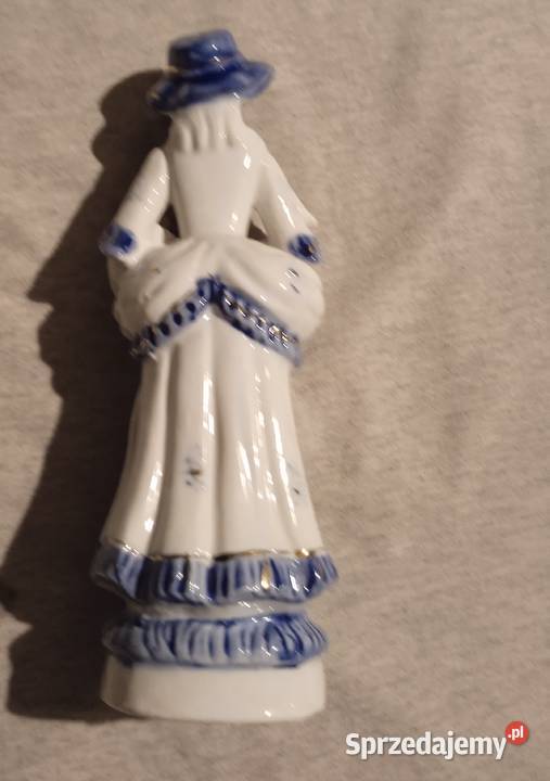 Porcelanowa figurka dziewczyna z bukietem i Koźminek