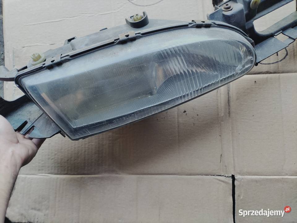 LAMPA PRZÓD PRZEDNIA PRAWA REFLEKTOR PRAWY FORD Oświetlenie Kamień-Kolonia