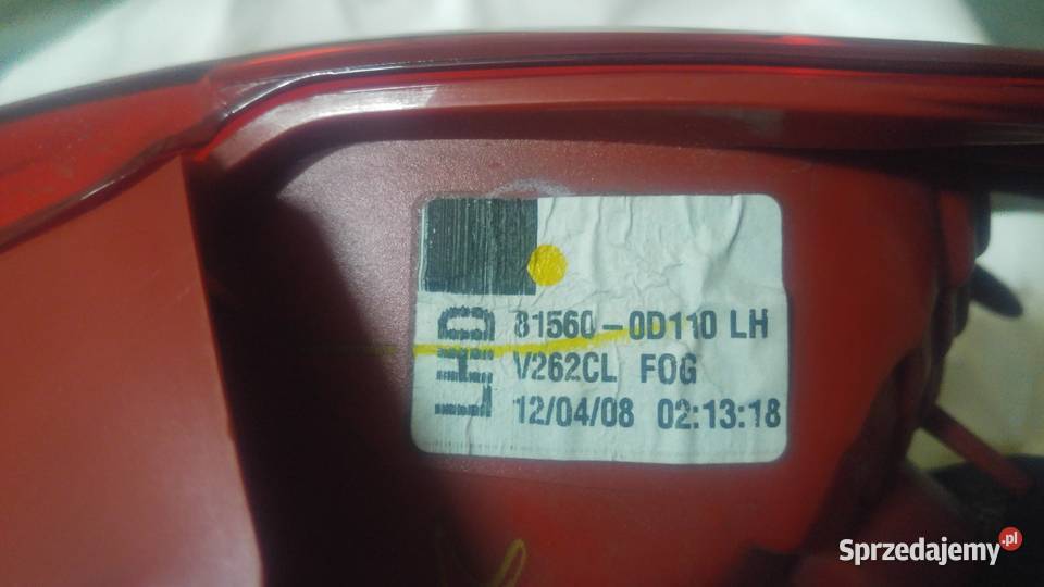 Oryginalna lampa Toyota Yaris II LUNA 2008 tył lewe
