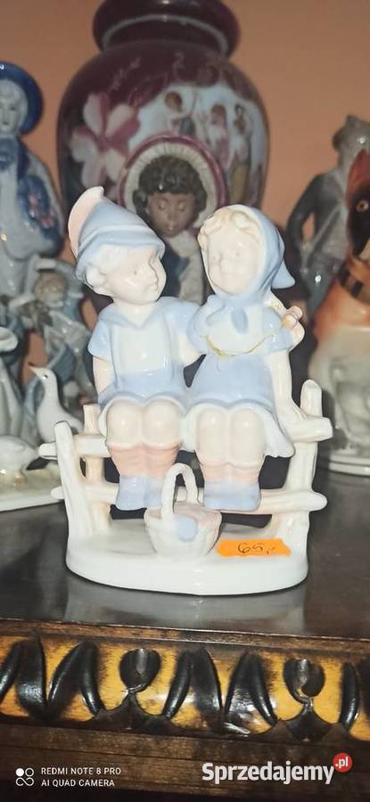 Figurka Dzieci na płocie z koszyczkiem SygTerra pomorskie Gdańsk