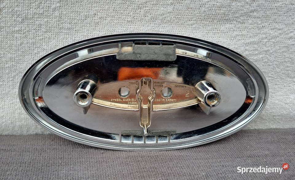 Emblemat logo zderzaka przód Kia Sportage IV Mielęcin