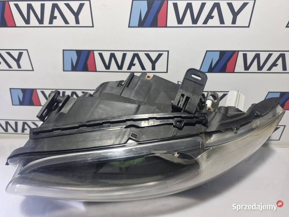 BMW E81 E82 E87 LAMPA LEWY PRZÓD ORYGINAŁ