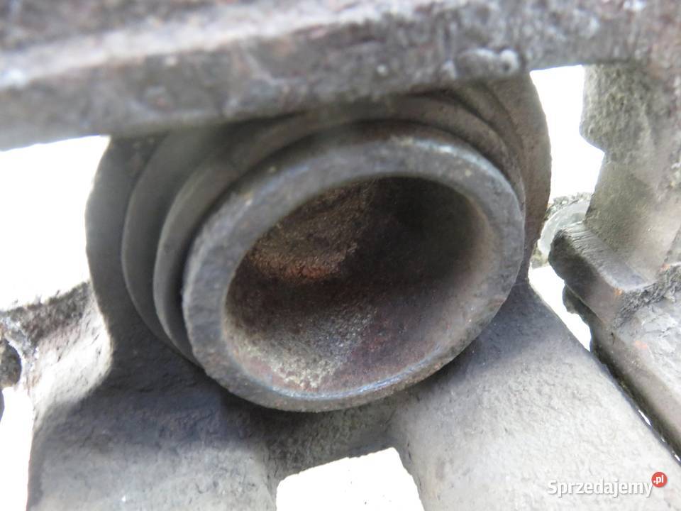 ZACISK LEWY PRZÓD TOYOTA COROLLA Verso 20 D4D