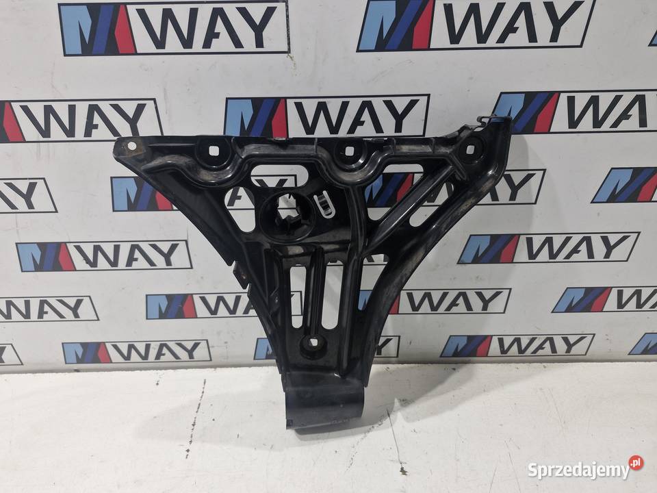 7060795 BMW E61 ŚLIZG MOCOWANIE ZDERZAKA LEWY