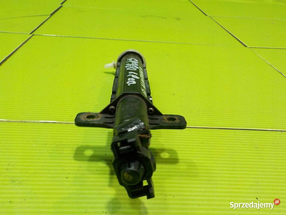 RENAULT LAGUNA III 10r spryskiwacz lampy lewy Spryskiwacze reflektorów Suków