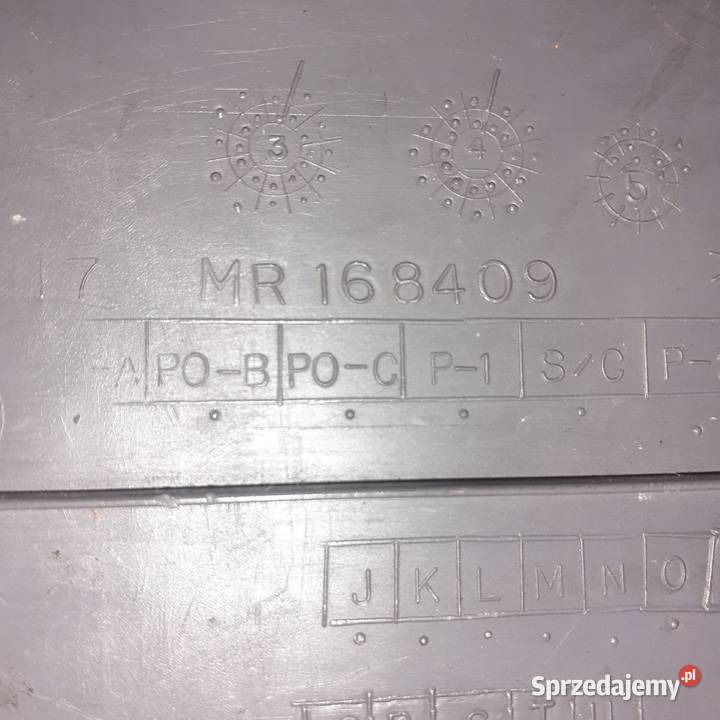 Zaślepka osłona bagażnika lampy lewa Mitsubishi