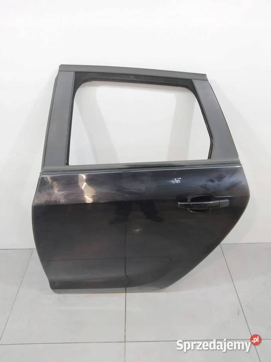 DRZWI LEWE TYŁ KOMBI Z20R Opel Astra IV 2009