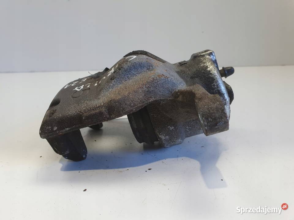 Toyota Corolla XII E21 PRZEDNI ZACISK HAMULCOWY Janów
