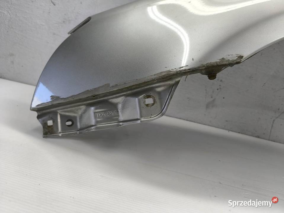 BLOTNIK LEWY PRZÓD TOYOTA AVENSIS II T25 osobowe Samochody na części Wolsztyn