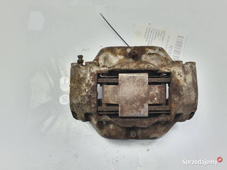 ZACISK HAMULCOWY PRZÓD LEWY VOLVO 240 Lipno