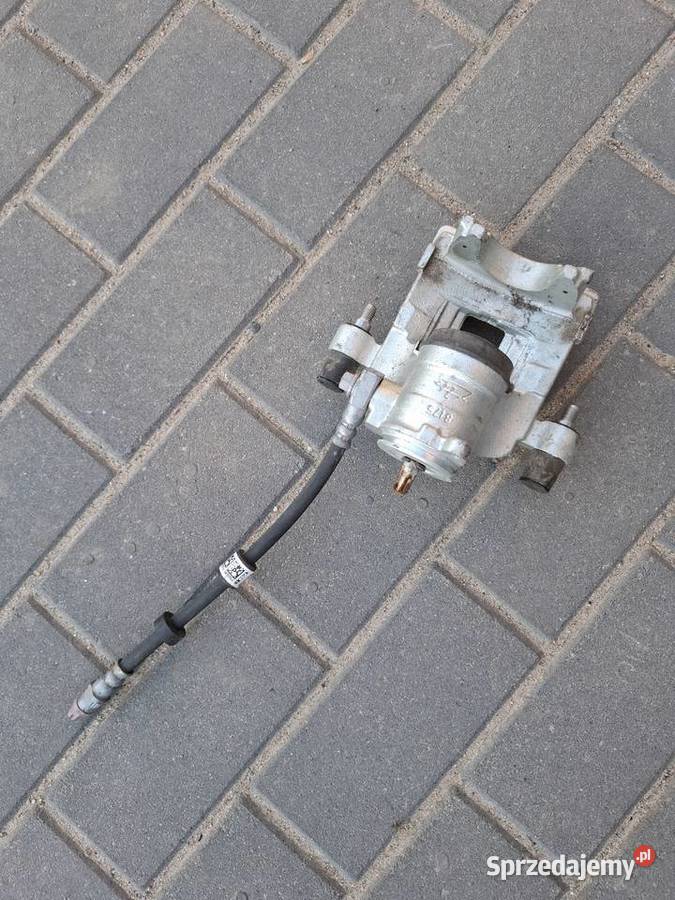 ZACISK HAMULCOWY lewy 32217363 TYŁ VOLVO XC90