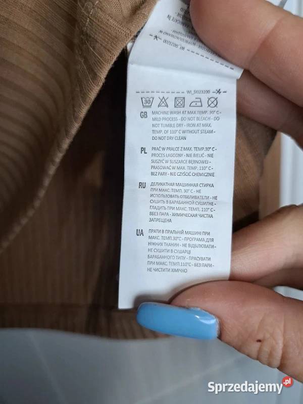 Stylowa koszulka w prążkowany sweterek Sinsay z pomorskie Trąbki Wielkie