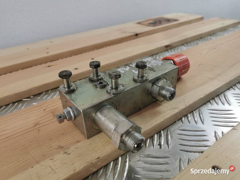 Zamek hydrauliczny siłownika wychyłu Holland LM Pozostałe