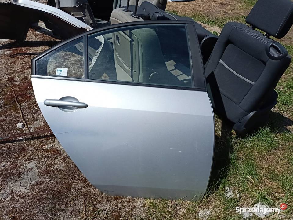 drzwi prawy tył nissan primera P12 KLO G Szczecin