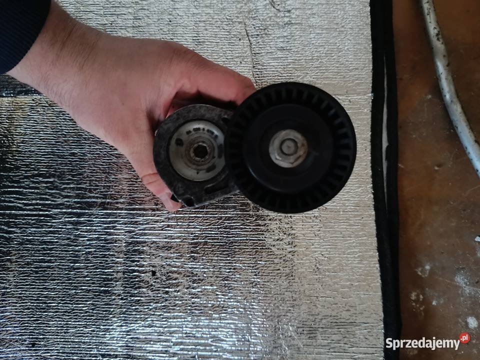 Napinacz paska wielorowkowego BMW e81 e87 20B Jawor