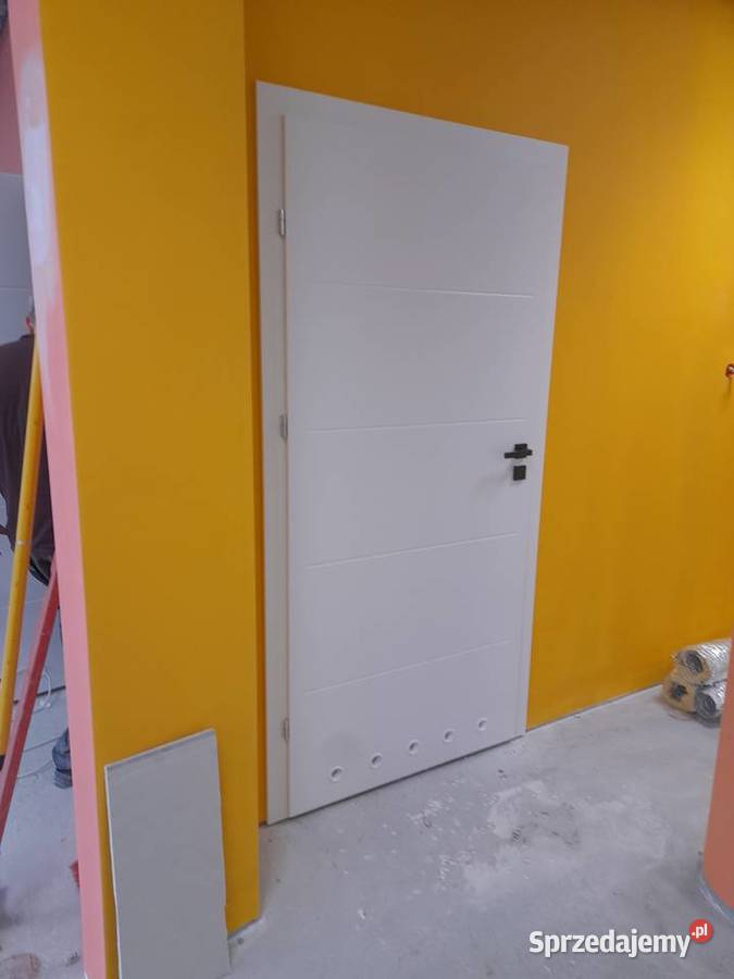 Montaż drzwi I paneli deski podlogowej Kraków