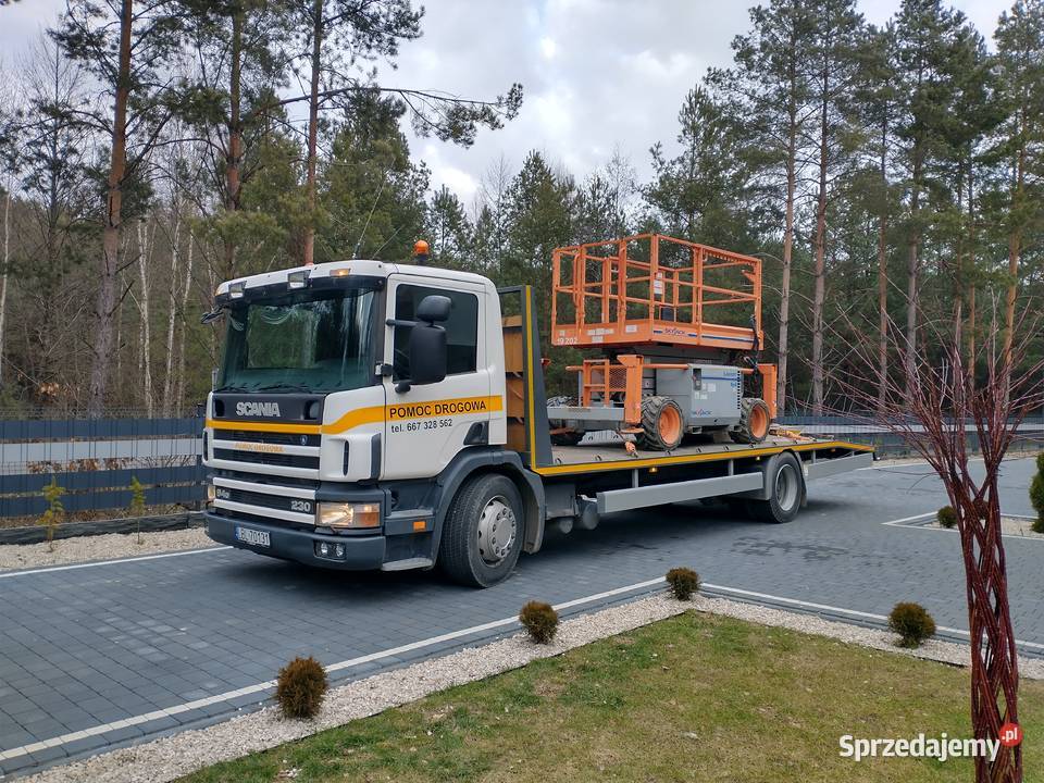Pomoc drogowa laweta transport ciągników koparek Frampol