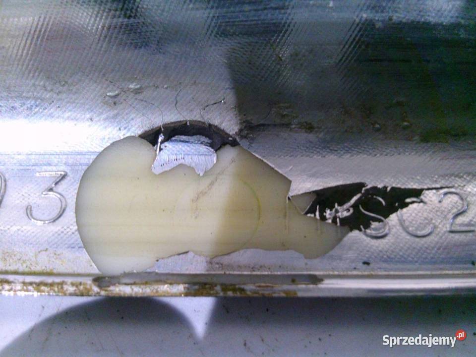 MITSUBISHI L200 07r ramka chromowa lampy lewej Części montażowe Kielce