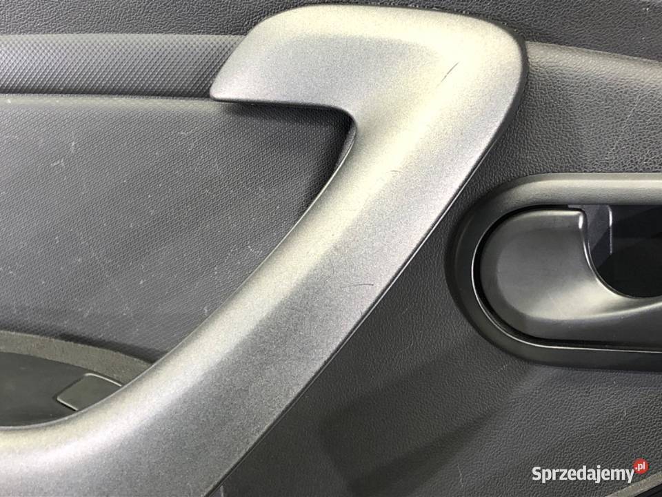 BOCZEK DRZWI LEWY PRZÓD DACIA DUSTER 809014949R