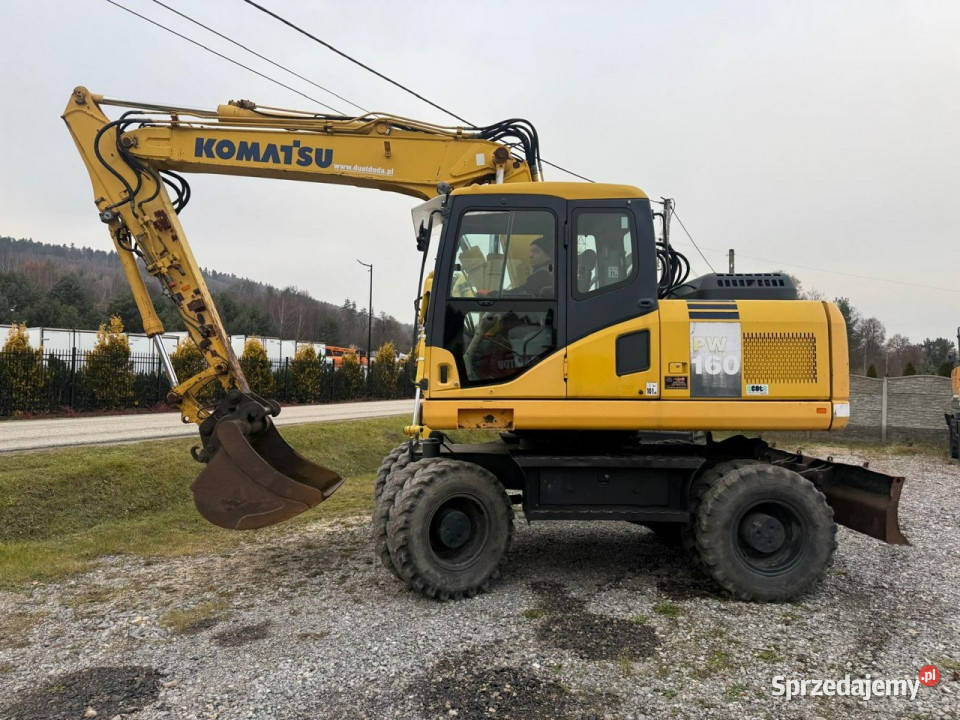 kołowa Komatsu PW1607E0 Szybko Złącze Sprawna 13500h Widełki