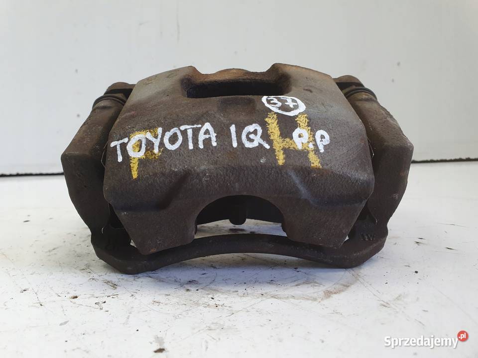 Toyota IQ PRAWY PRZEDNI ZACISK HAMULCOWY przód Rudka