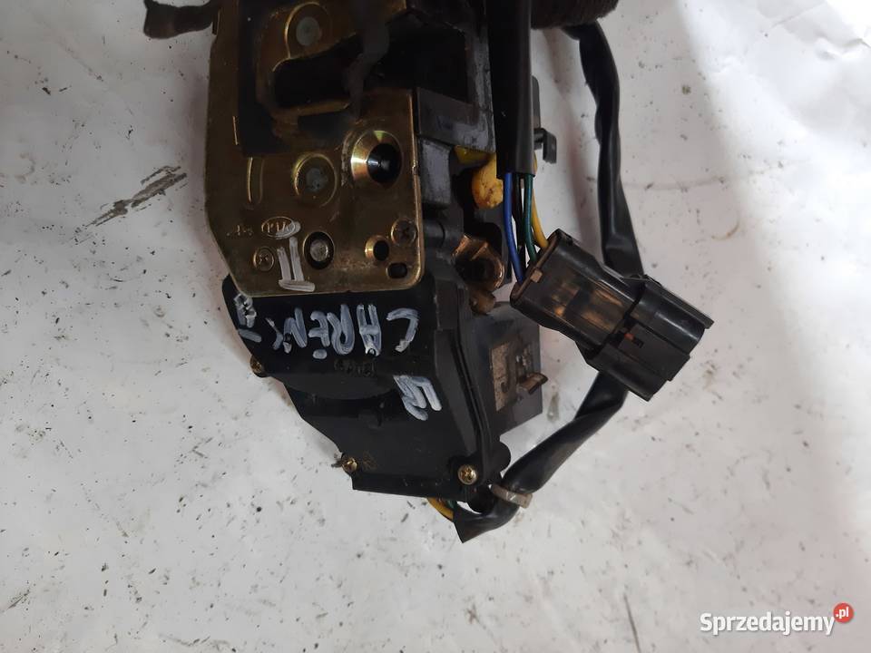 Kia Carens II Zamek Drzwi Lewy Przód łódzkie Ksawerów