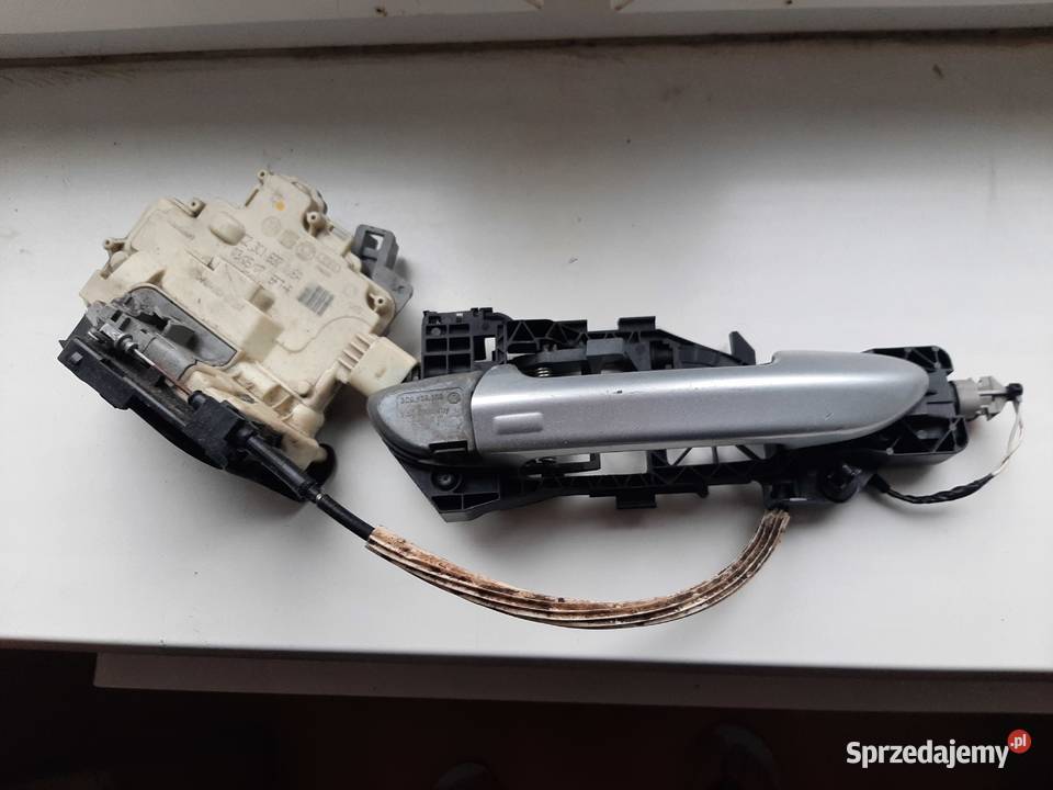 Zamek drzwi prawy przód VW Passat B6B7 Części samochodowe pomorskie Wejherowo