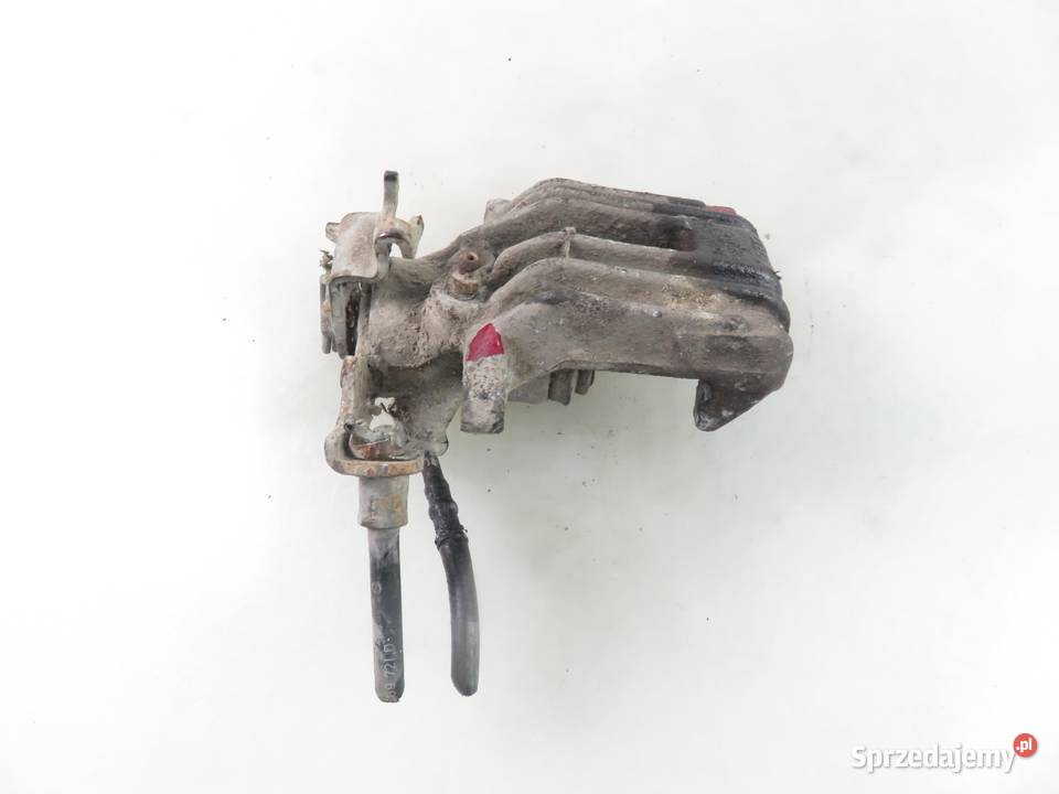 ZACISK LEWY TYŁ AUDI A6 C5 25 TDI