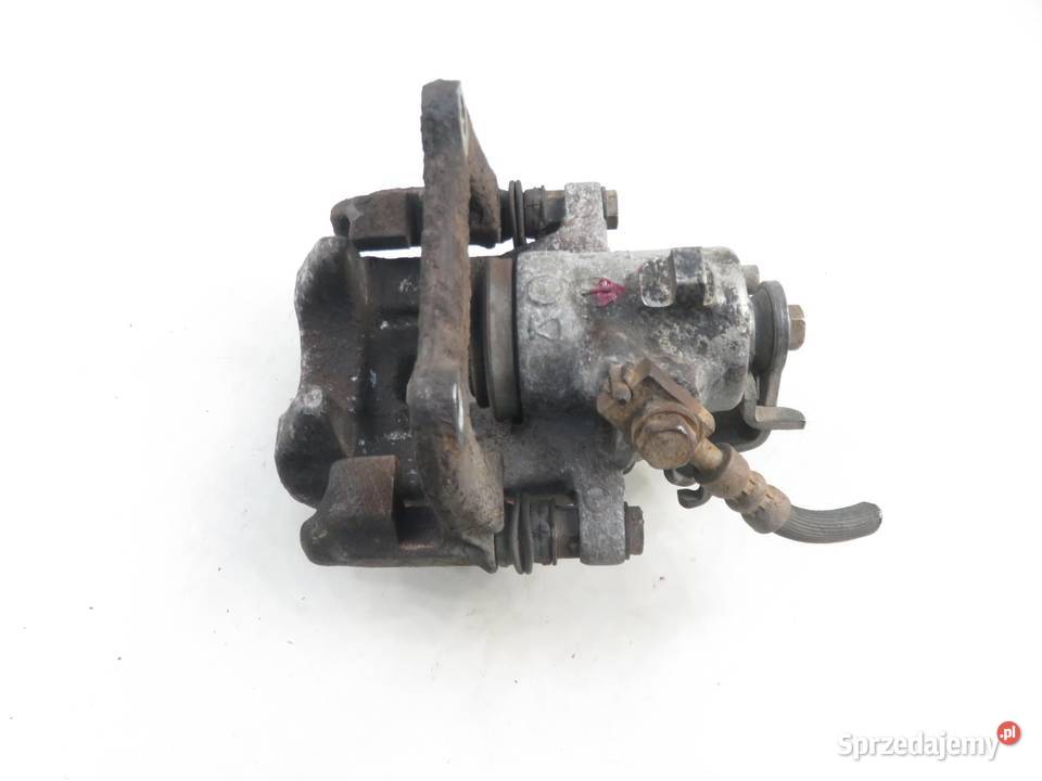 ZACISK LEWY TYŁ AUDI A4 B7 20 TDI