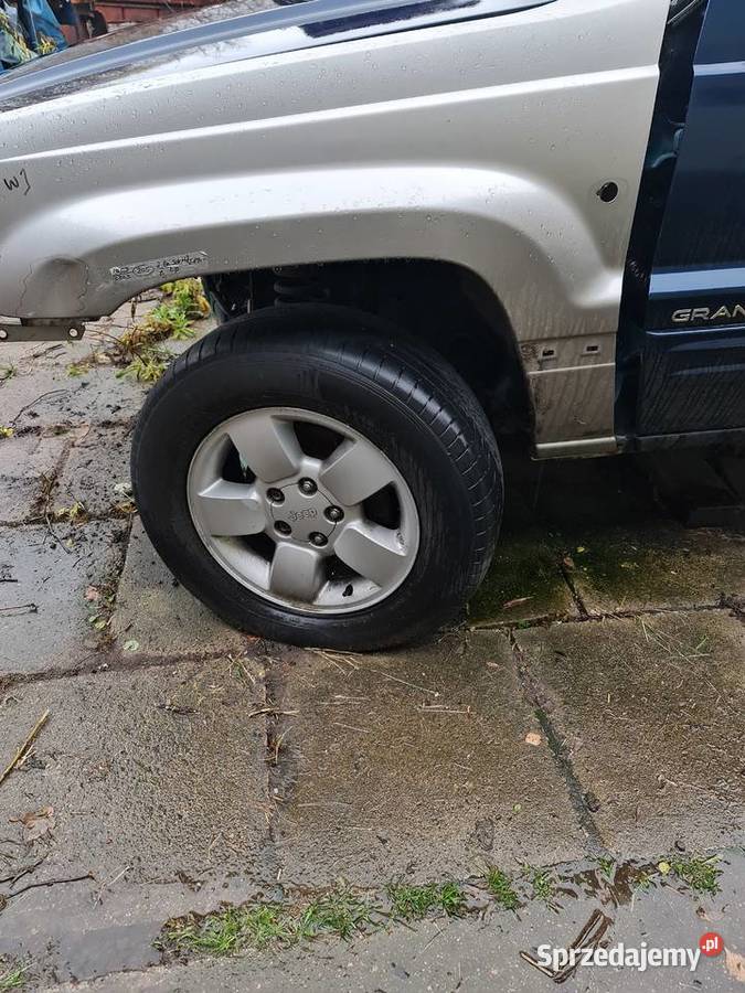 Jeep Grand Cherokee WJ błotnik L przód